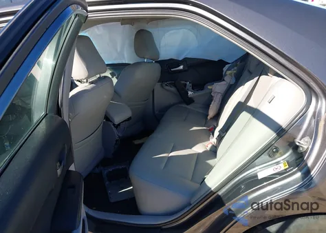 2014 Toyota Camry Le z USA, uszkodzony, nr VIN 4T4BF1FK0ER340627